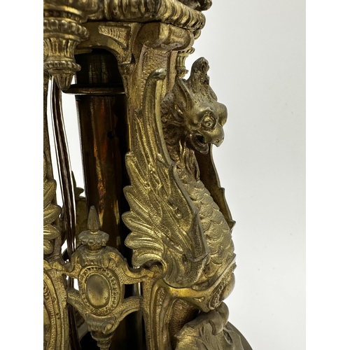 2184 - Good 19th century ormolu table lamp base, the trifom shape cast with griffins, foliage and Islamic f... 