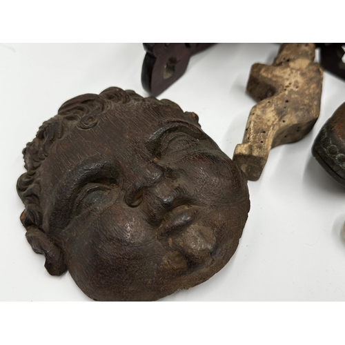 261 - Good mixed lot of treen comprising - carved cherub head, articulated pig, hand painted lacquered por... 