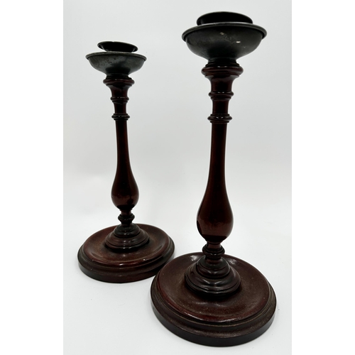 268 - Pair of 19th century turned mahogany candlesticks, 30cm high