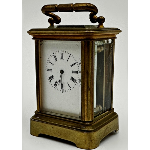 1055 - Miniature brass cased carriage clock, 7.25cm high