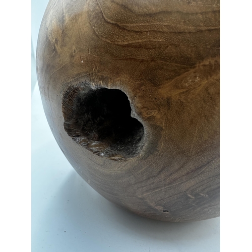 275 - Large fruitwood apple, 31cm high with a further wooden masonry mallet (2)