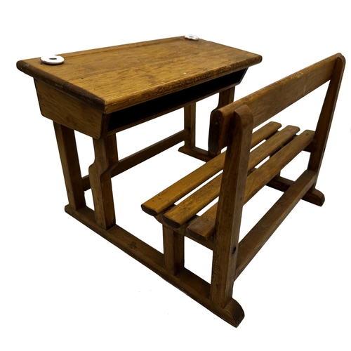 269 - Vintage pine scale model of a school desk, with ceramic inkwells, 26cm high x 35cm wide