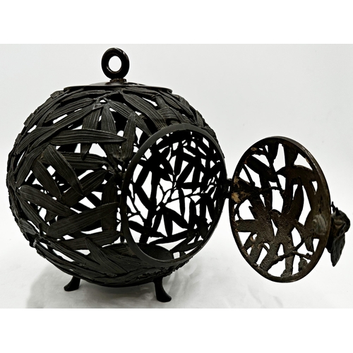 220 - Japanese bronze globe shaped lantern with overlapping leaves and cicada clasp, 23cm high