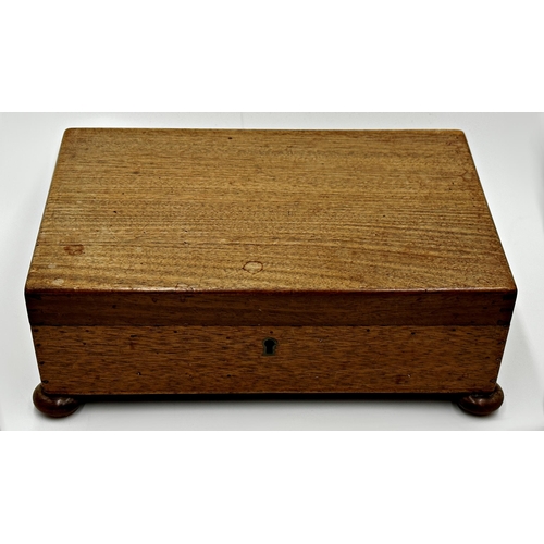 Three antique wooden caskets to include a birdseye maple glovebox with ...