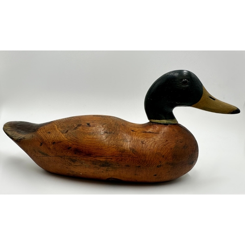 285 - Early 20th century American Folk Art decoy duck, with glass eyes and painted decoration, 'Mississipp... 