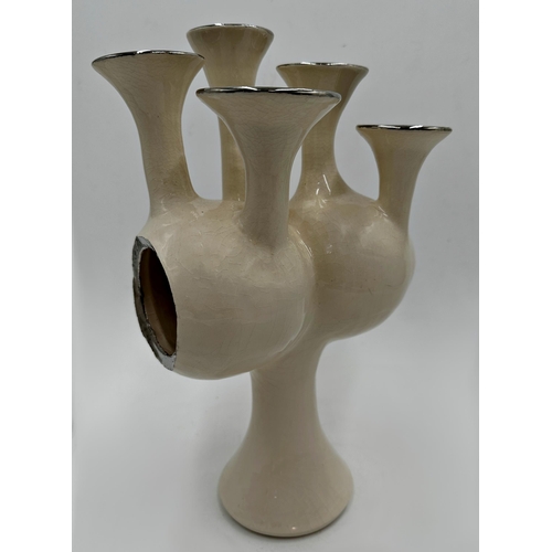 189 - Unusual 'Dead Legacy' pottery vase, four trumpet spouts with silvered interior, 36cm high