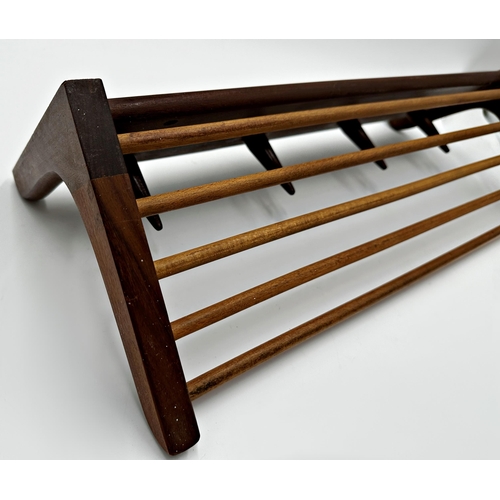 2261 - Good Danish teak luggage rack, with four turned pegs, 56cm long, with further crossbanded Danish tea... 