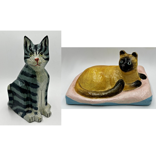 407 - Two large papier mache cats, a Siamese on a cushion, 26cm H x 41cm W, and a seated tabby 37cm high (... 