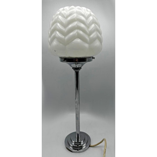 2207 - Art Deco chrome and opaline glass table lamp, with shaped faceted shade upon a singular column and s... 