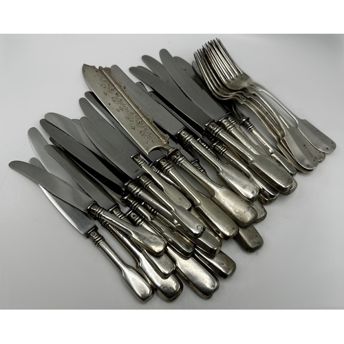 1227 - Collection of Austrian 800 silver fiddle flatware comprising eight table forks, twelve table knives,... 