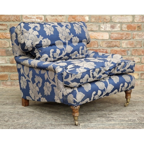 2378 - Contemporary Howard style armchair with floral upholstery raised on brass castors H 71cm x W 79cm x ... 