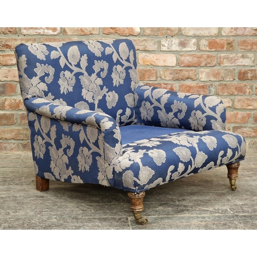 2378 - Contemporary Howard style armchair with floral upholstery raised on brass castors H 71cm x W 79cm x ... 