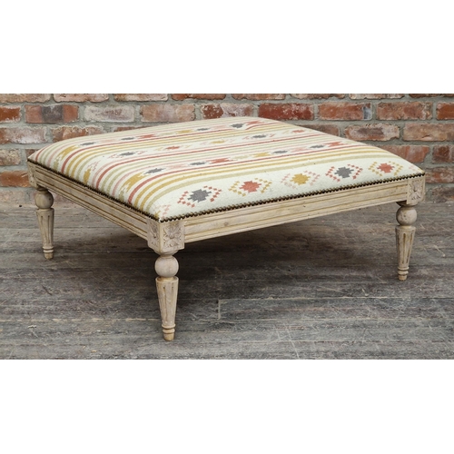 2392 - Large contemporary kilim upholstered footstool with studded edging, carved detail, raised on turned ... 