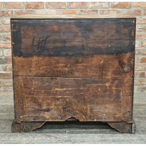 2404 - Georgian oak bureau with fall front, fitted interior, four graduated drawers, raised on bracket feet... 