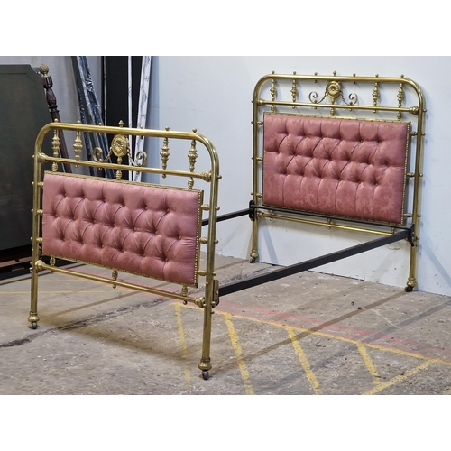 2426 - Victorian brass bedstead with iron side rails, cushioned head and footboard, studded edging, raised ... 