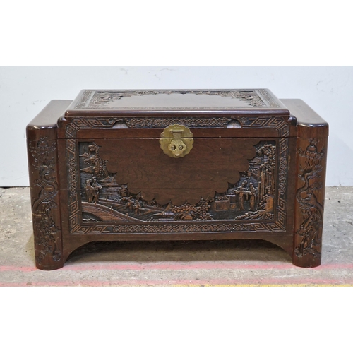 2427 - Oriental carved camphor wood blanket box with brass hinged lock, H 56cm x W 101cm x D 54cm