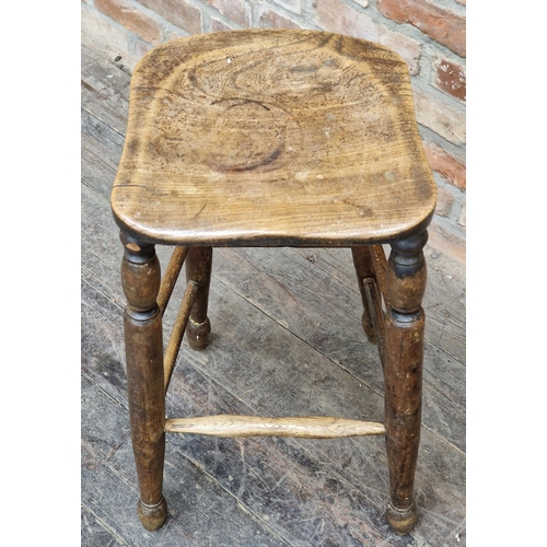 2358 - Antique elm tavern stool with saddle shaped seat, H 71cm x W 36cm