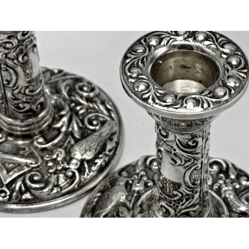 1163 - Pair of 1960s silver Victorian style embossed candlesticks, maker B & Co, Birmingham 1964, 10cm high