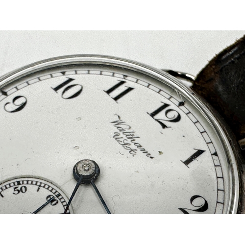 1042 - Early Waltham silver trench watch, 32mm case, enamel dial with Arabic numerals and subsidiary second... 