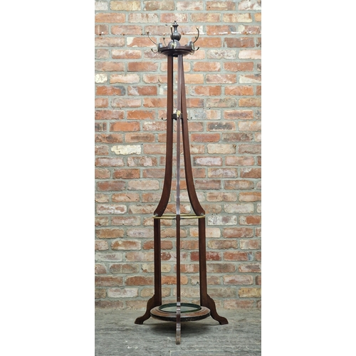 2423 - Victorian oak hall stand with brass hooks and three moulded supports, on a circular base with squat ... 