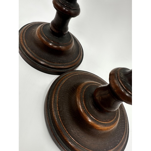 273 - Pair of 19th century turned oak baluster candlesticks, 35cm high (2)