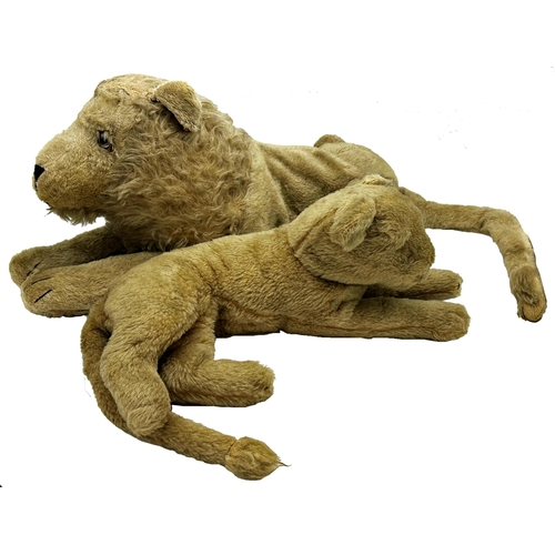 442 - Vintage straw stuffed recumbent lion, tail to head 603cm, with a similar lioness (2)