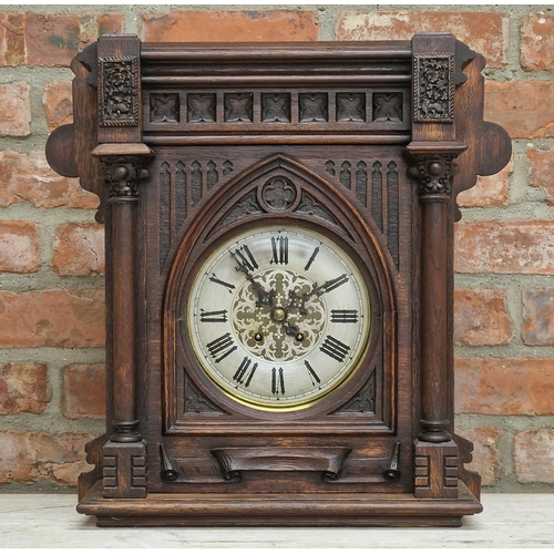 1060 - Arts and Crafts Gothic oak cased architectural mantle clock, two train brass dial with Gothic Roman ... 