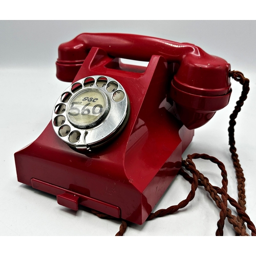 419 - Vintage red Bakelite telephone