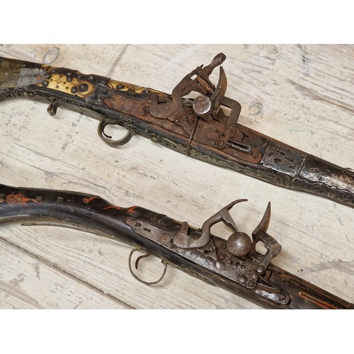 406 - Two Persian Ottoman type rifles, 163cm and 120cm long respectively