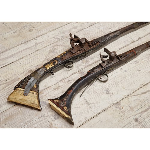 406 - Two Persian Ottoman type rifles, 163cm and 120cm long respectively