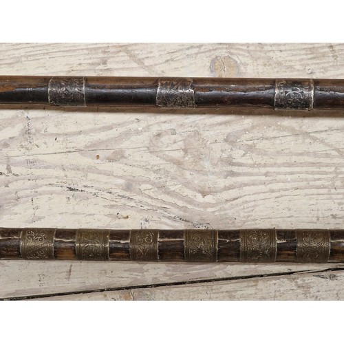 406 - Two Persian Ottoman type rifles, 163cm and 120cm long respectively