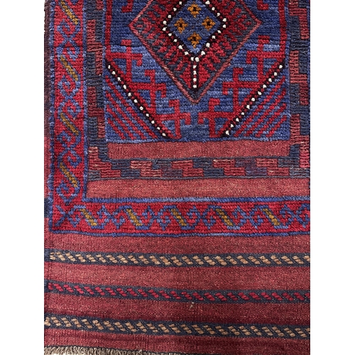 1416 - Red Meshwani runner. Measures 246 x 58cm