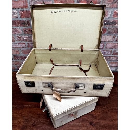 2421 - Matched pair of 1930s vellum suitcases, the largest 45 x 71cm