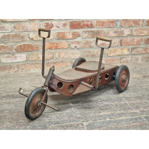 276 - Vintage mid century hand operated tin plate child's tricycle with working wheels, H 45cm x W 97cm x ... 