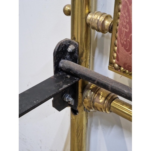 1205 - Victorian brass bedstead with iron side rails, cushioned head and footboard, studded edging, raised ... 