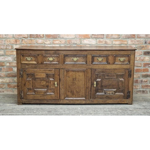 1257 - Early Georgian period Welsh oak geometric split moulded dresser base, three drawers and two cupboard... 