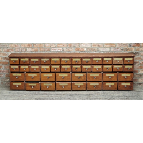 1275 - Incredible 19th century mahogany apothecary bank of drawers, comprising forty drawers in total each ... 