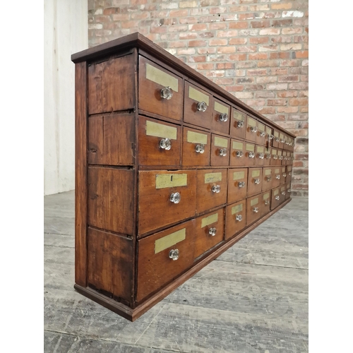 1275 - Incredible 19th century mahogany apothecary bank of drawers, comprising forty drawers in total each ... 