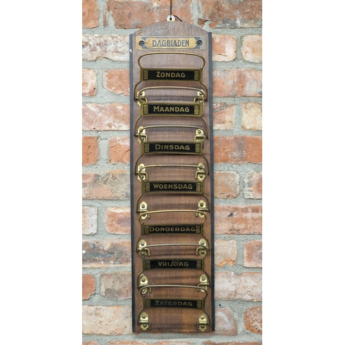 2329 - Novelty Dutch Newspaper rack, waterfall hinged brass brackets inscribed with a day of the week, 79cm... 