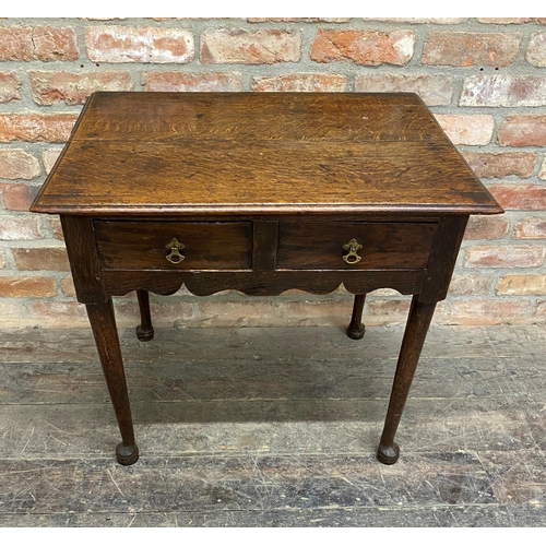 1243 - Early Georgian oak side table with two frieze drawers raised on pad feet, H 68cm x W 74cm x D 51cm