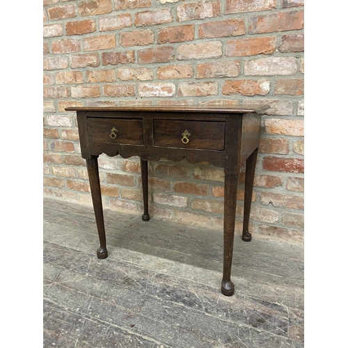 1243 - Early Georgian oak side table with two frieze drawers raised on pad feet, H 68cm x W 74cm x D 51cm