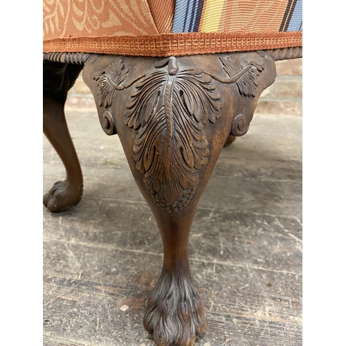 1272 - 19th century Irish mahogany footstool, the stuff over top with gadrooned apron, acanthus cabriole le... 