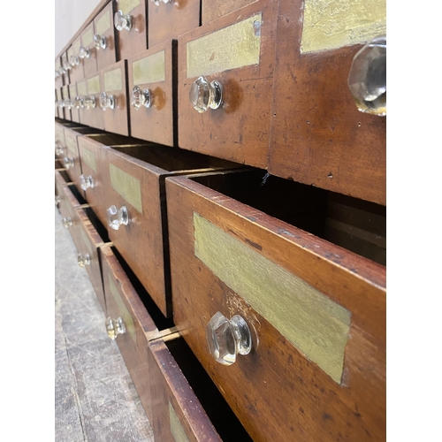 1275 - Incredible 19th century mahogany apothecary bank of drawers, comprising forty drawers in total each ... 