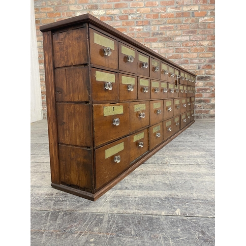 1275 - Incredible 19th century mahogany apothecary bank of drawers, comprising forty drawers in total each ... 