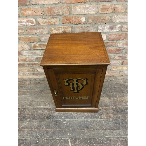 1284 - Late 19th century walnut cupboard the hinged door gilt inscribed 'perfumes' enclosing a shelved inte... 