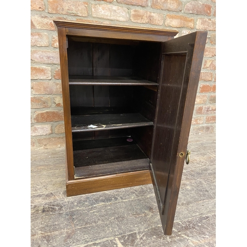 1284 - Late 19th century walnut cupboard the hinged door gilt inscribed 'perfumes' enclosing a shelved inte... 