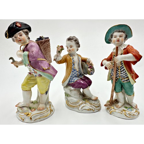 2183 - Three Meissen porcelain figures of grape picker, flower picker and gardener boys, 14cm high (3)