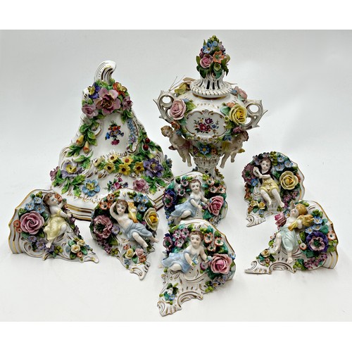 2191 - Set of six Sitzendorf porcelain wall brackets, with cherubs and bocage porcelain, each 12cm high, wi... 