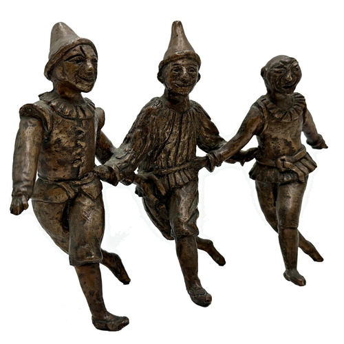 2398 - Good mid 20th century bronze character group of three performing clowns or Pierrots, unsigned, 19cm ... 