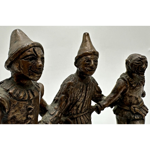 2398 - Good mid 20th century bronze character group of three performing clowns or Pierrots, unsigned, 19cm ... 